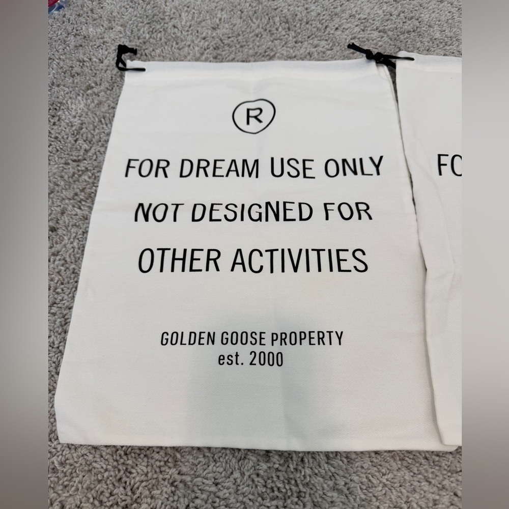 Golden Goose Cream Drawstring Bag with Black Text